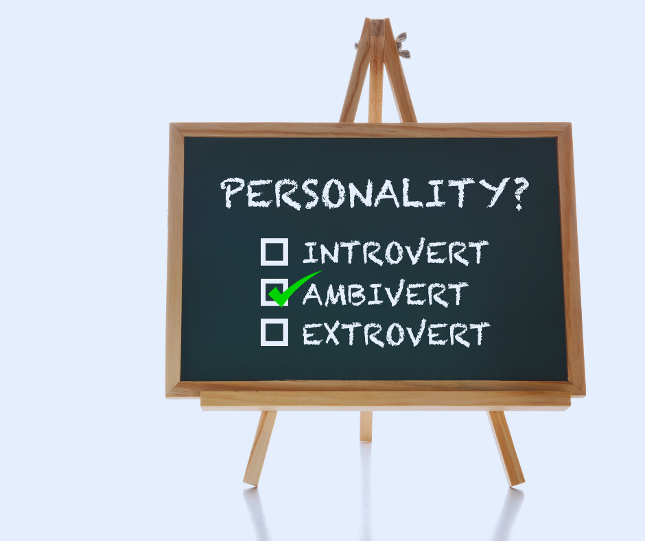 A blackboard with personality? written on it, featuring introvert, ambivert and extrovert as three answer options, with a check mark next to ambivert.